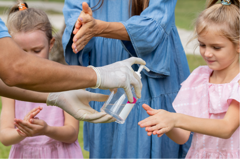 Applying an antibacterial gel outside for hands. Source: Canva