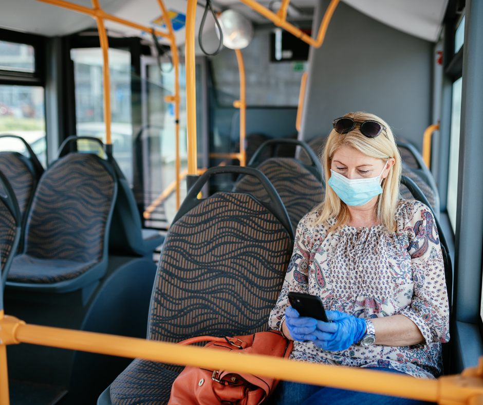 Woman traveling with a public transport. 
Source: Canva