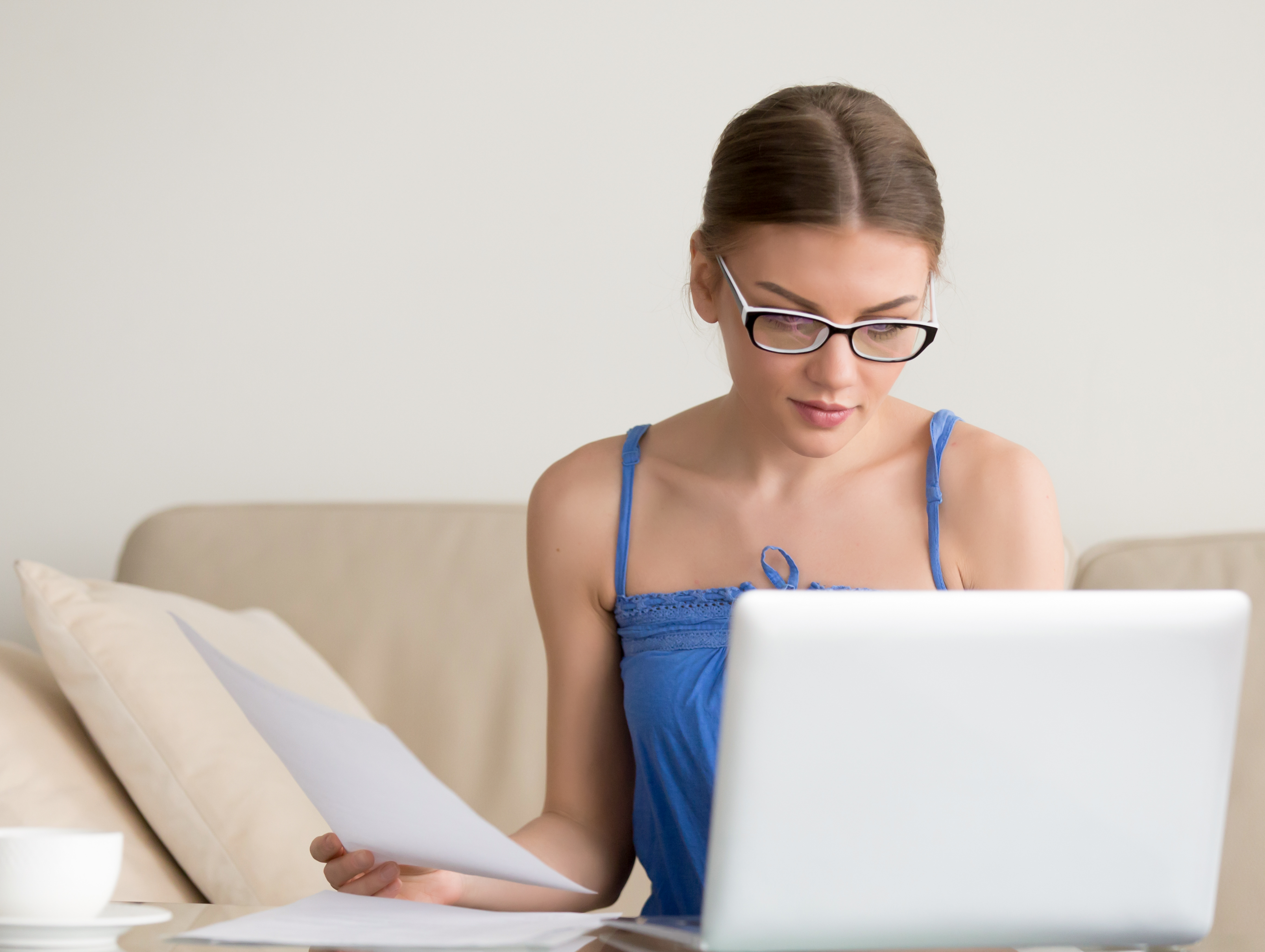 Woman doing a research. Source: Canva